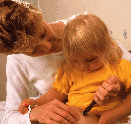 Image: Young girl with diabetes is given an injection by her mother (Photo courtesy of Saturn Stills / SPL).